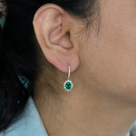 Emerald Stud Earrings in 14K Yellow Gold | Diamond Accents | Oval Cut | 7x5mm | May Birthstone