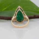 14K yellow gold Zambian emerald pear ring with diamond accents