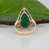 14K yellow gold Zambian emerald pear ring with diamond accents