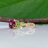 14K yellow gold purple garnet ring with tsavorite accents