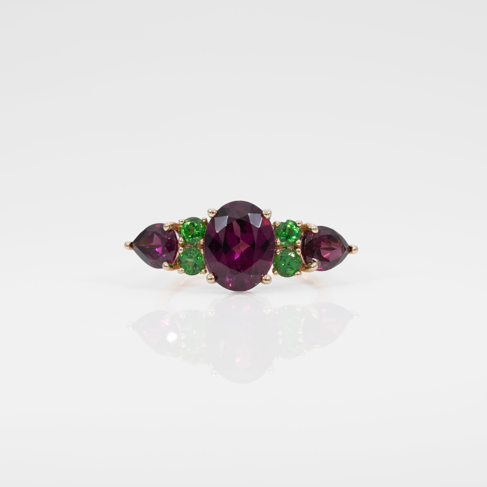 14K yellow gold purple garnet ring