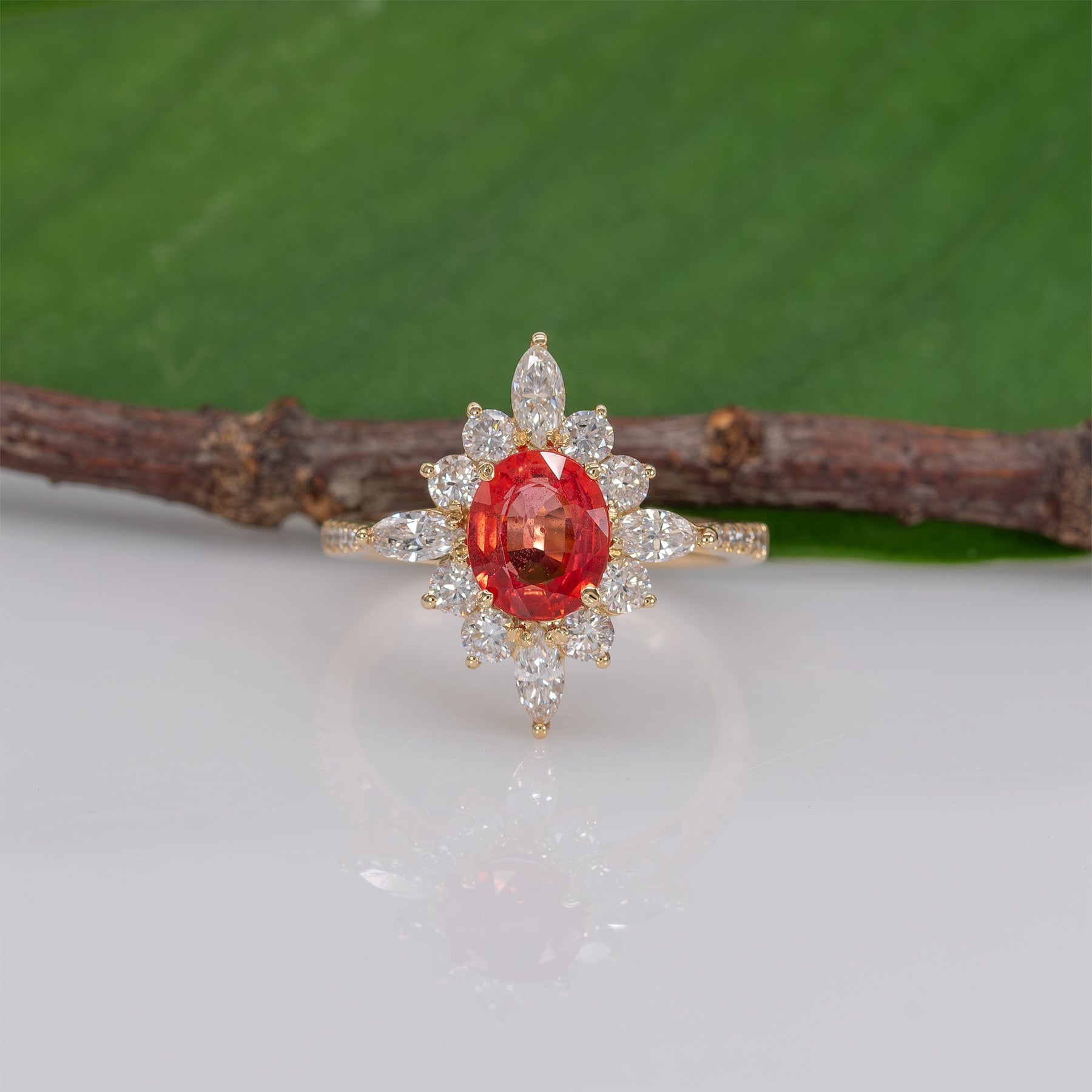 14K yellow gold padparadscha sapphire ring with diamond accents