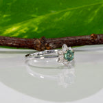 14K white gold alexandrite ring with diamond accents