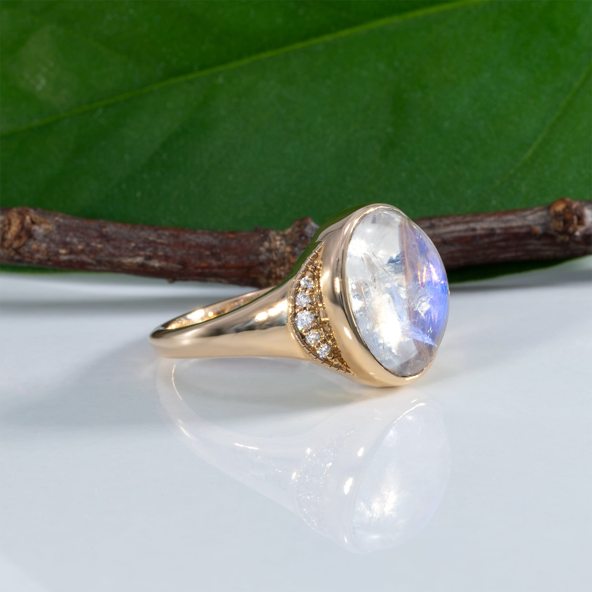 14K yellow gold rainbow moonstone cabochon ring with diamonds