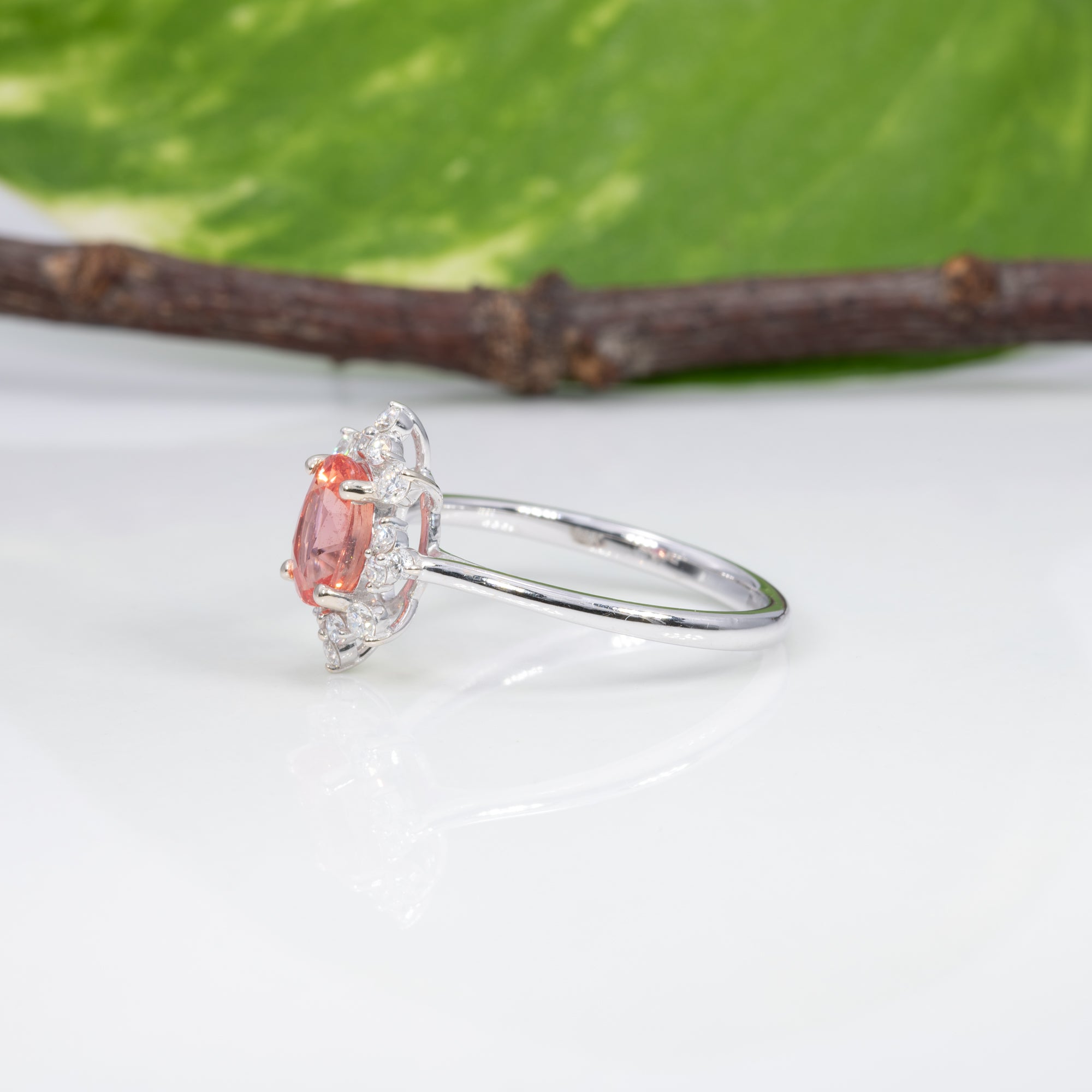 14K white gold padparadscha sapphire ring with diamond accents