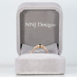 14K rose gold alexandrite ring with diamond accents