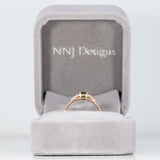 14K rose gold alexandrite ring with diamond accents