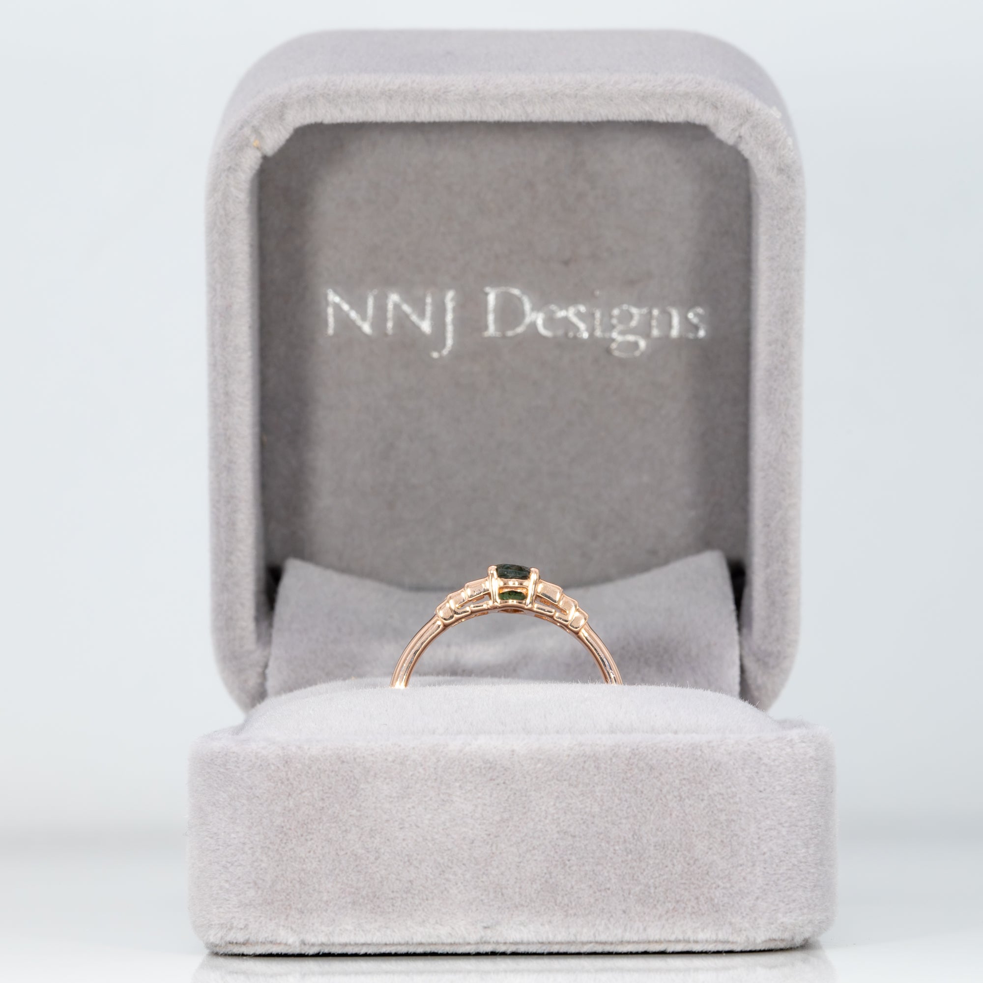 14K rose gold alexandrite ring with diamond accents