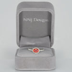 14K white gold padparadscha sapphire oval ring with diamond halo