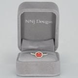 14K white gold padparadscha sapphire oval ring with diamond halo