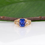 14K yellow gold cushion tanzanite ring with diamond accents
