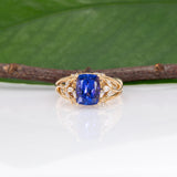 14K yellow gold cushion tanzanite ring with diamond accents