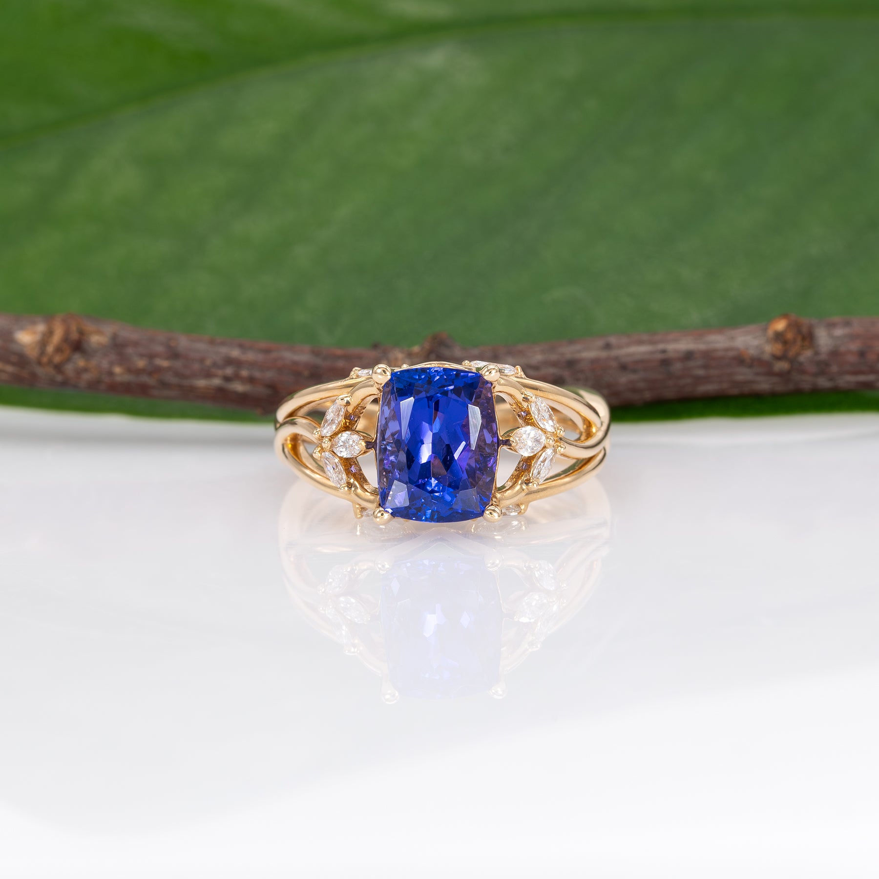 14K yellow gold cushion tanzanite ring with diamond accents