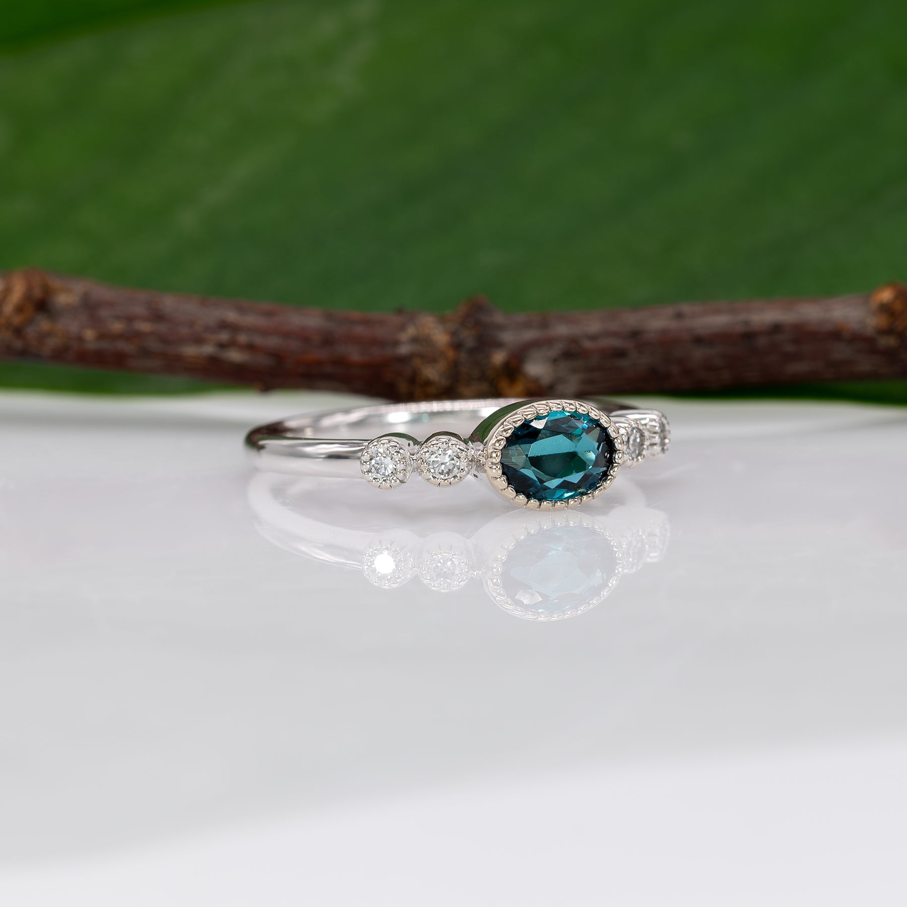 14K white gold indicolite tourmaline ring with diamond accents