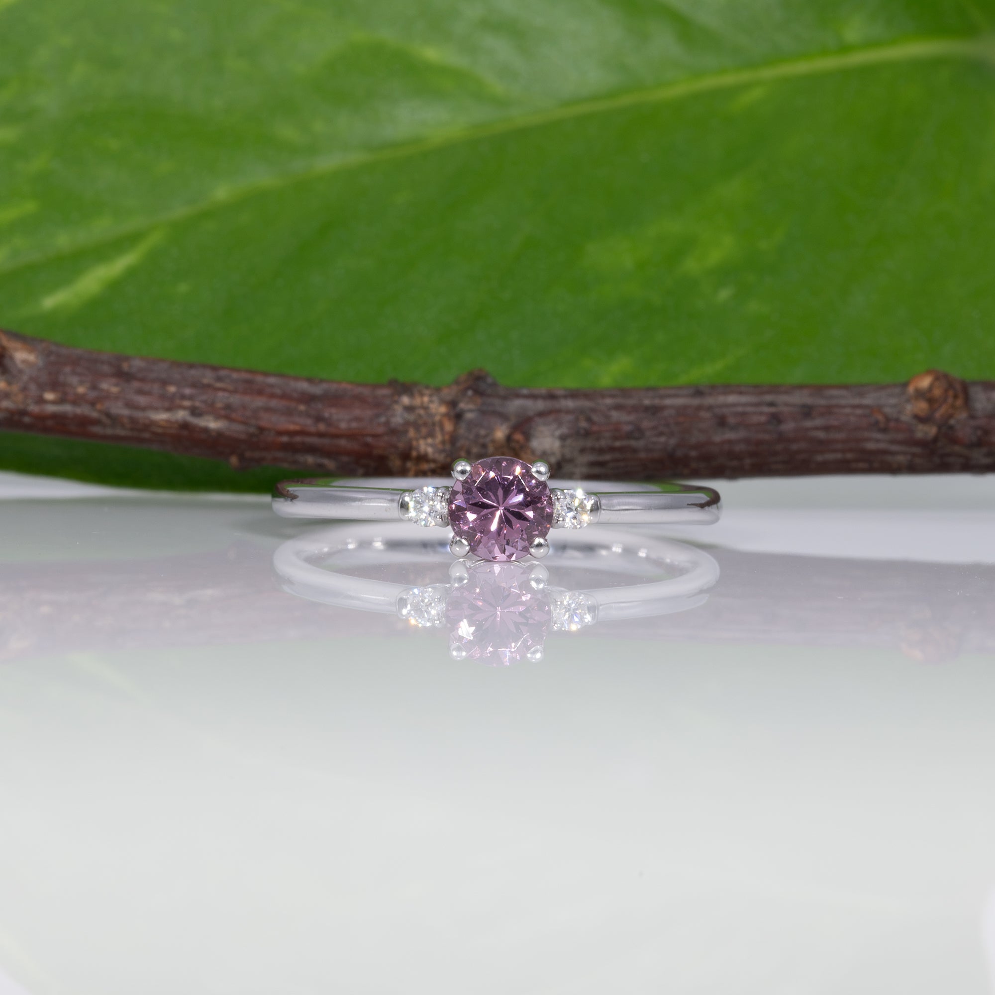 14K white gold minimal purple spinel ring with diamond accents
