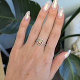 14K white gold bi-color tourmaline emerald-cut ring with diamond halo