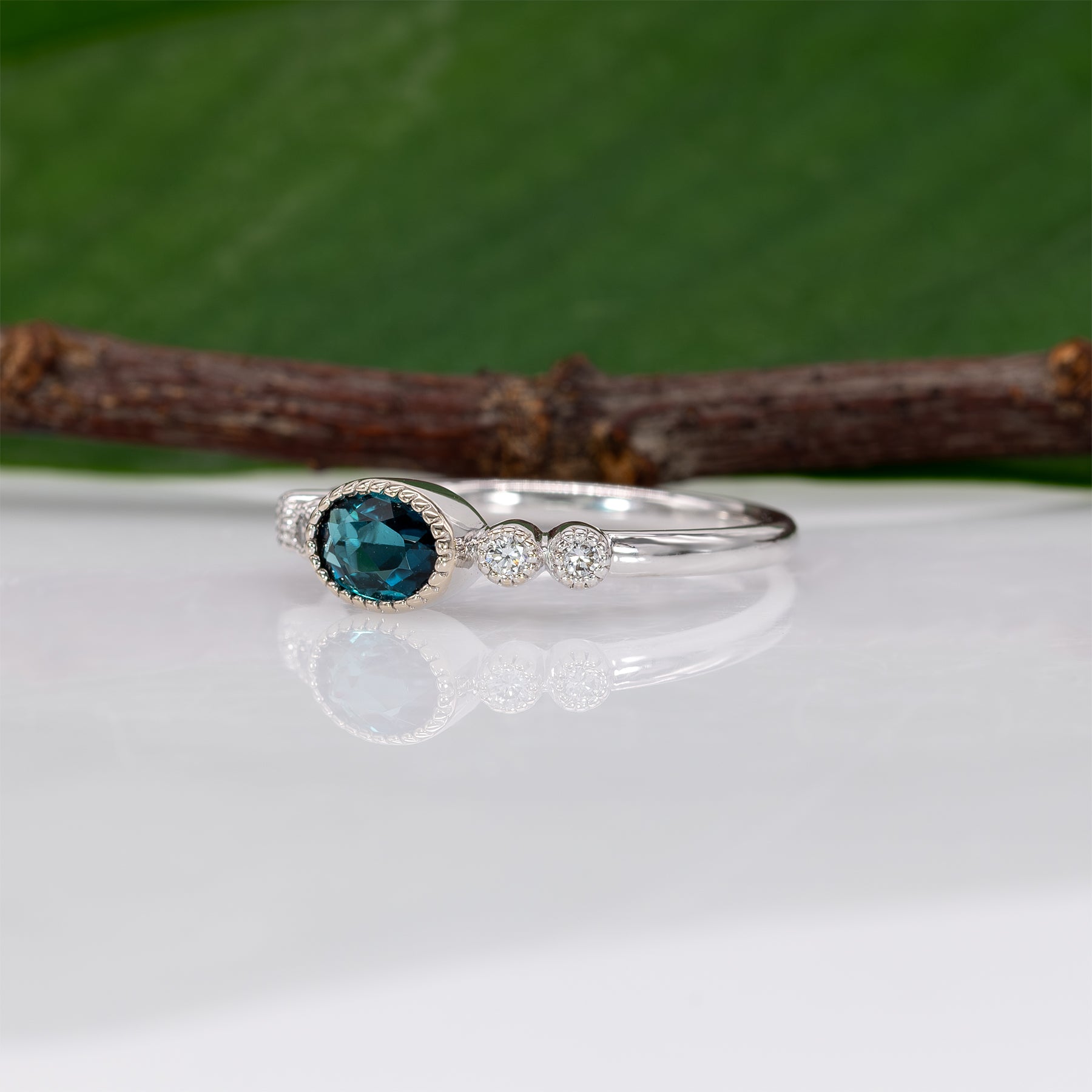 14K white gold indicolite tourmaline ring with diamond accents
