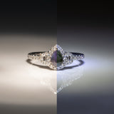 14K white gold pear alexandrite ring with diamond halo