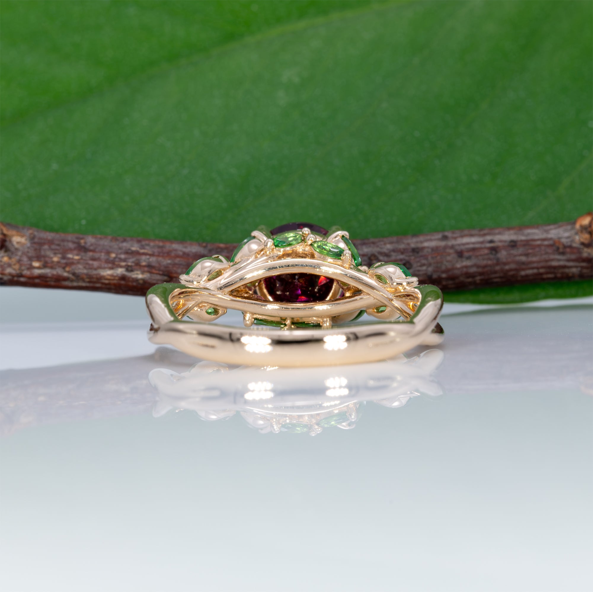 14K yellow gold purple garnet ring with tsavorite accents