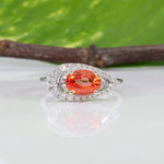 14K white gold padparadscha sapphire ring with diamond accents