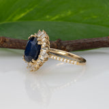 14K yellow gold GIA Ceylon sapphire cushion ring with diamond halo