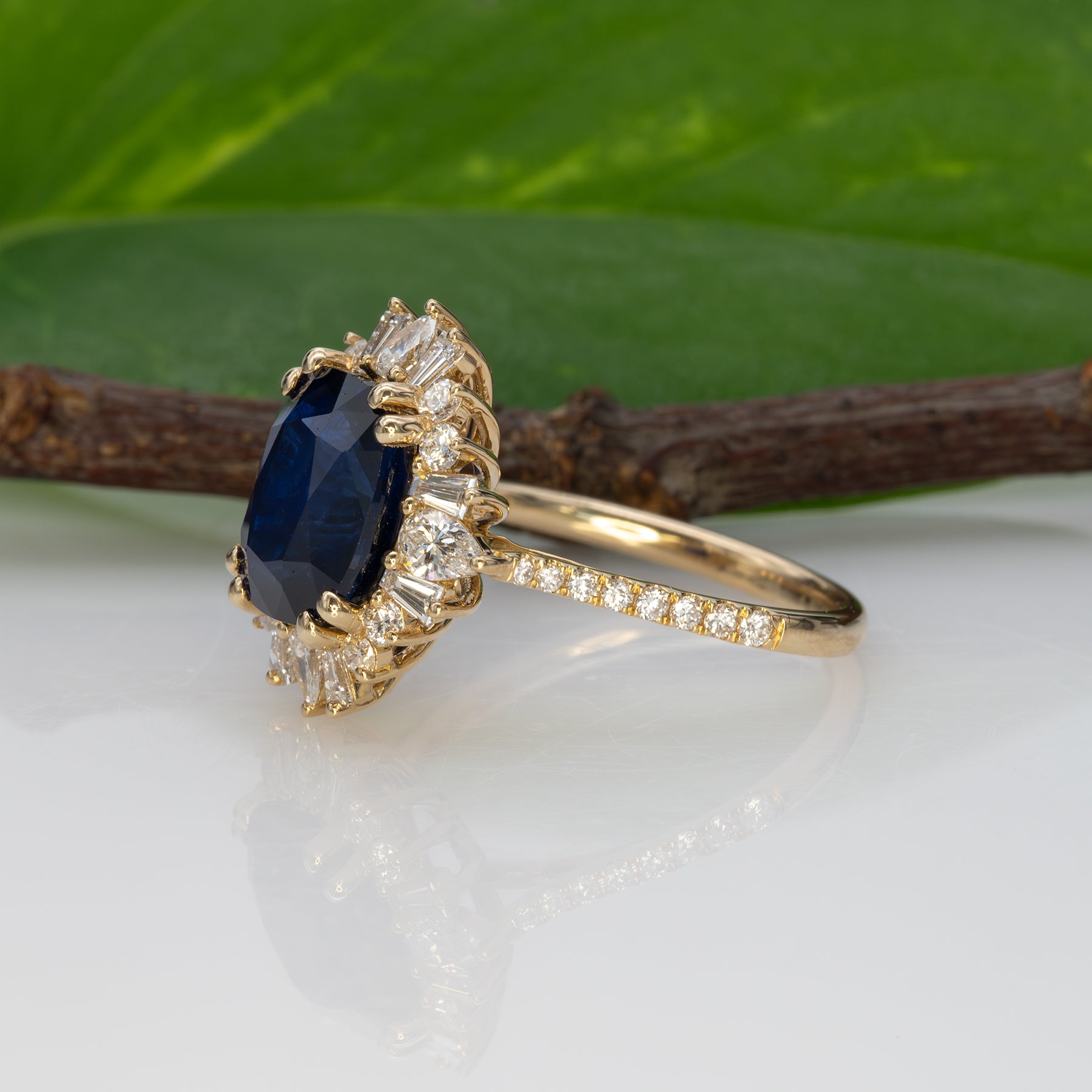14K yellow gold GIA Ceylon sapphire cushion ring with diamond halo