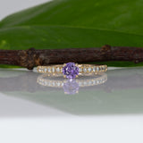 14K yellow gold purple sapphire round ring with diamond halo