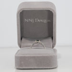 14K white gold pear alexandrite ring with diamond halo