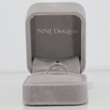 14K white gold pear alexandrite ring with diamond halo