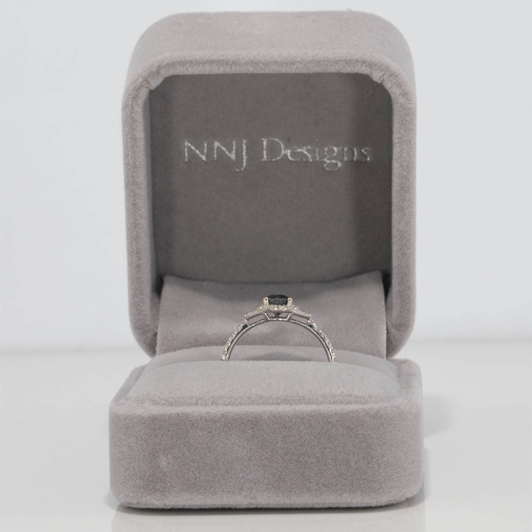 14K white gold pear alexandrite ring with diamond halo