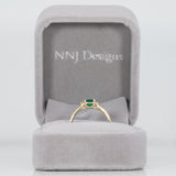 14K yellow gold colombian emerald ring with diamond accents