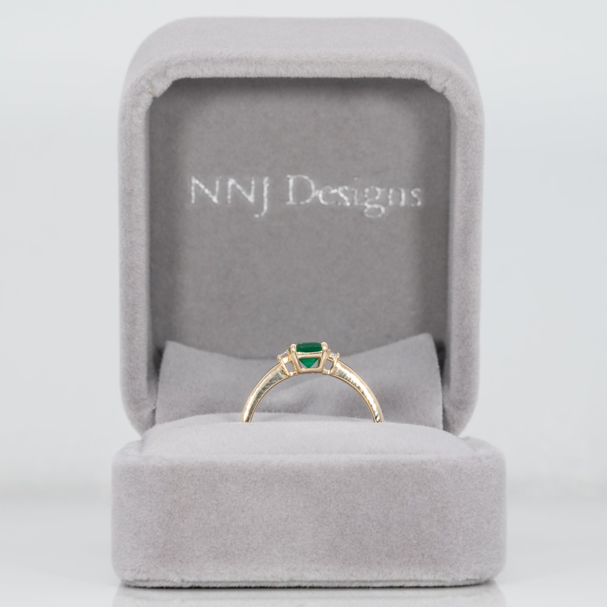 14K yellow gold colombian emerald ring with diamond accents