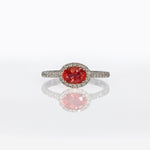 14K white gold padparadscha sapphire oval ring with diamond halo