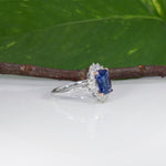 14K white and rose gold tanzanite ring with diamond accents