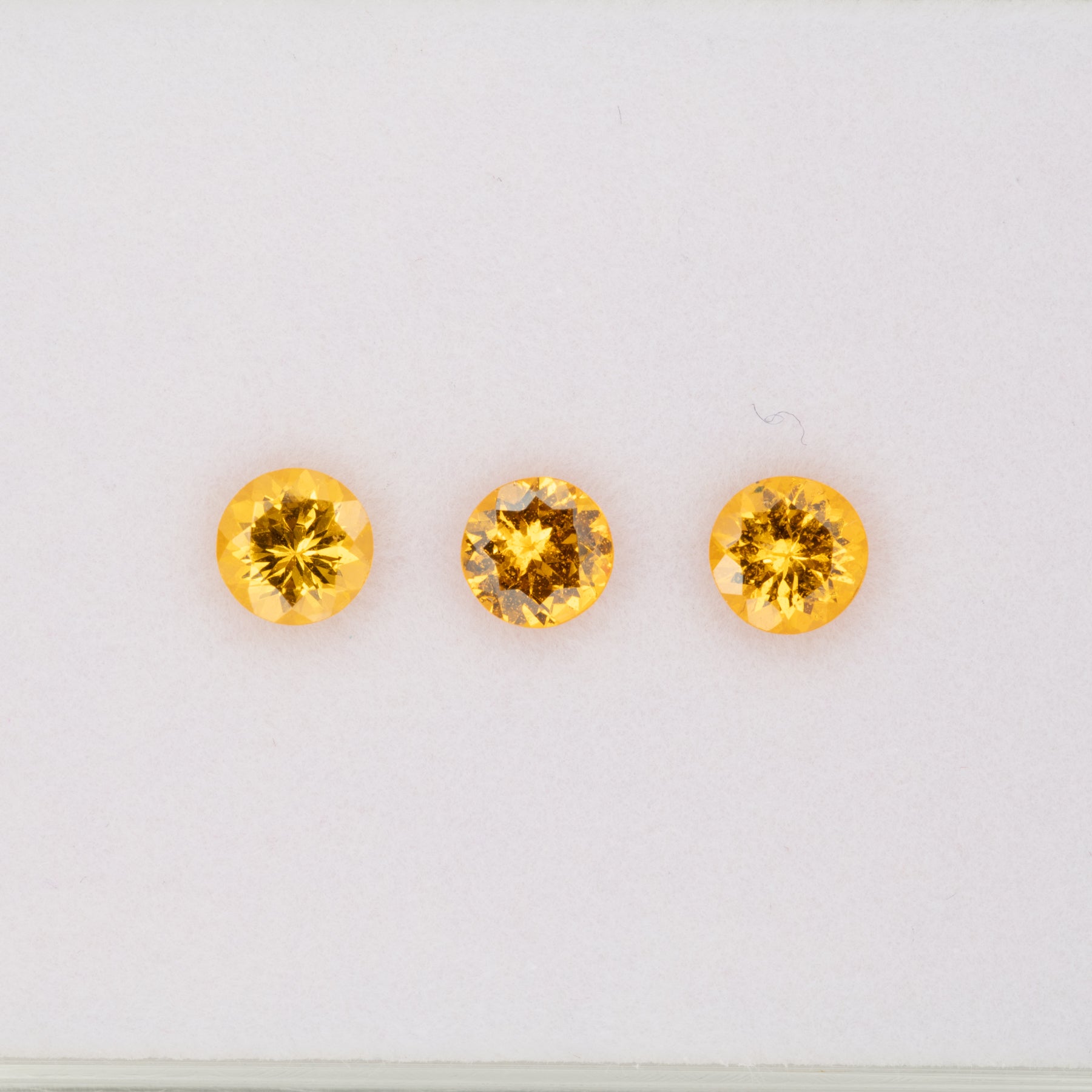 0.59ct Spessartite Garnet round 5mm loose orange gemstone
