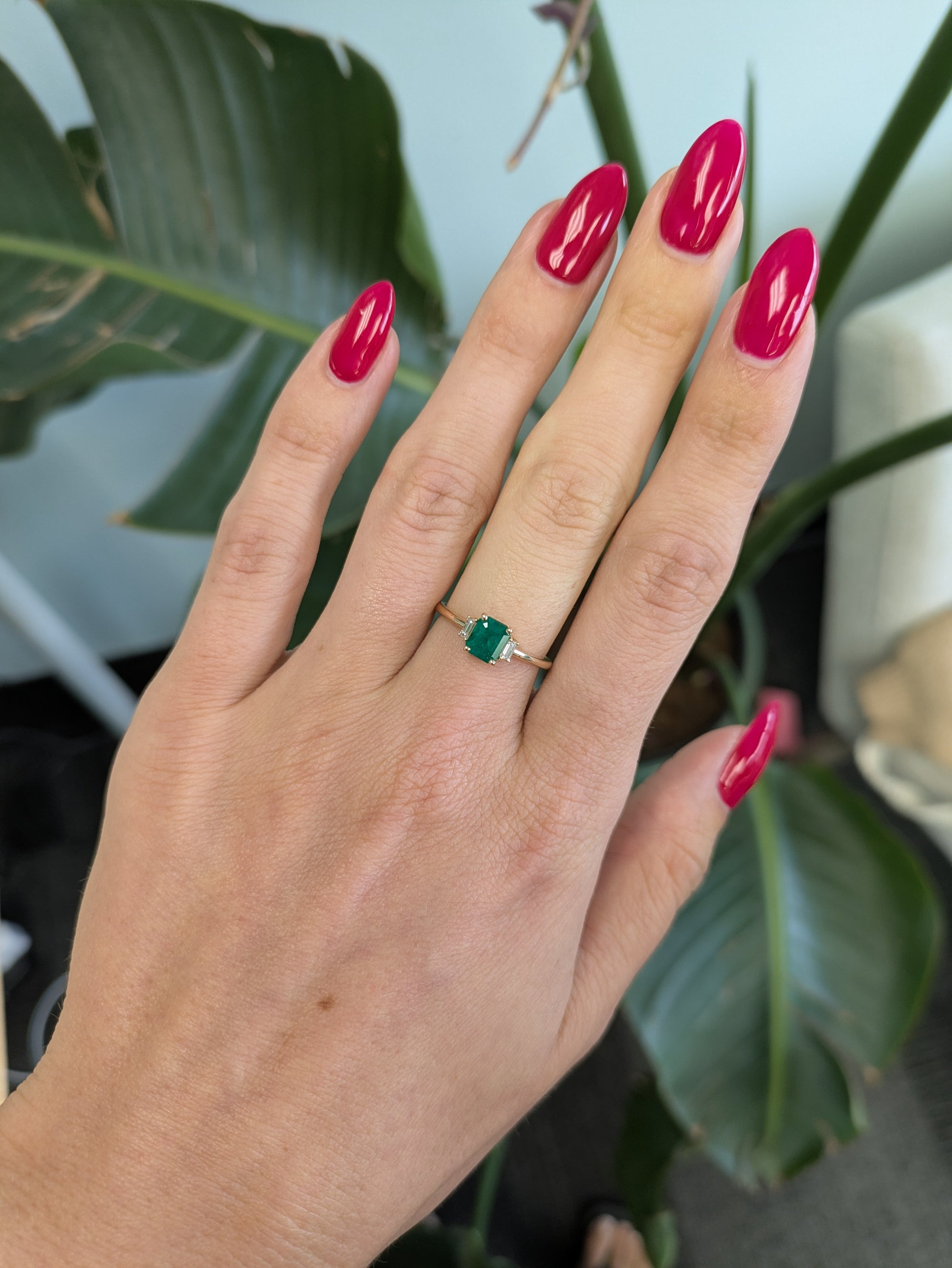 14K yellow gold colombian emerald ring with diamond accents