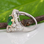 14K two-tone gold tsavorite garnet ring with diamond accents