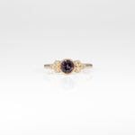 14K yellow gold bezel-set purple spinel ring with diamond accents