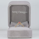 14K yellow gold padparadscha sapphire ring with diamond accents