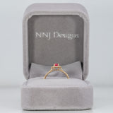 14K yellow gold padparadscha sapphire ring with diamond accents