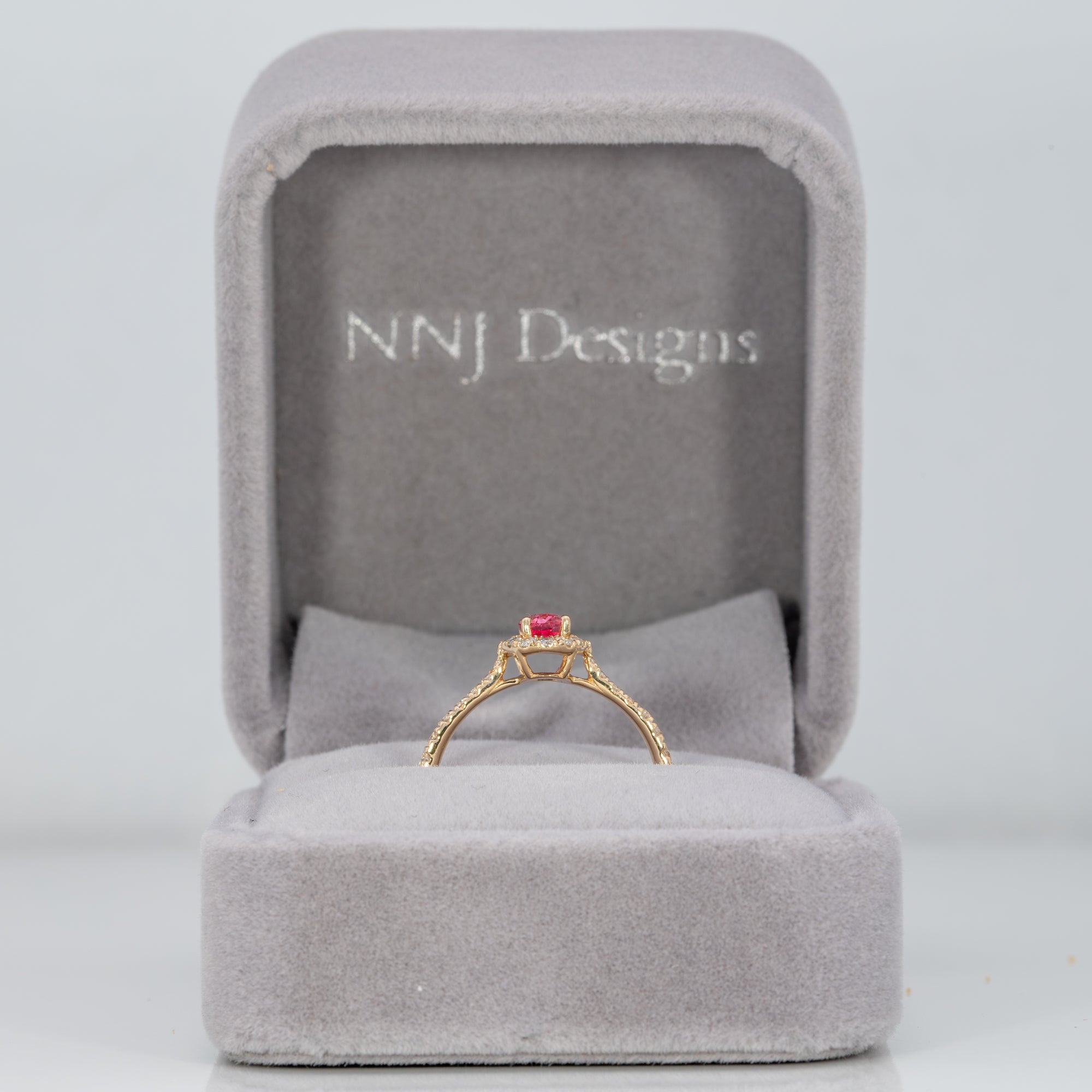 14K yellow gold padparadscha sapphire ring with diamond accents