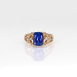 14K yellow gold cushion tanzanite ring with diamond accents