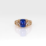 14K yellow gold cushion tanzanite ring with diamond accents