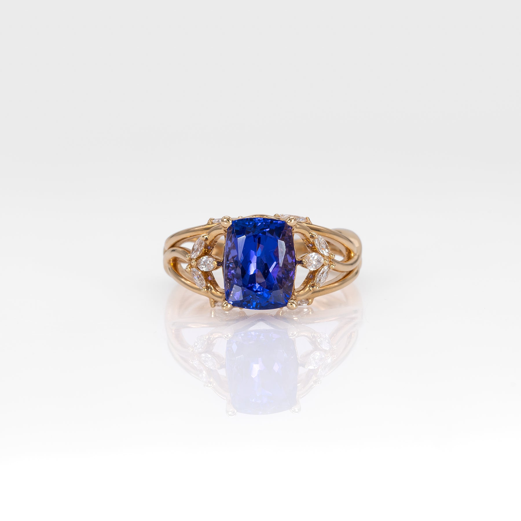14K yellow gold cushion tanzanite ring with diamond accents