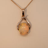 Ethiopian Opal Pendant Necklace with Earth Mined Diamond Accents in Solid 14K Gold – Oval 10x8mm Gemstone