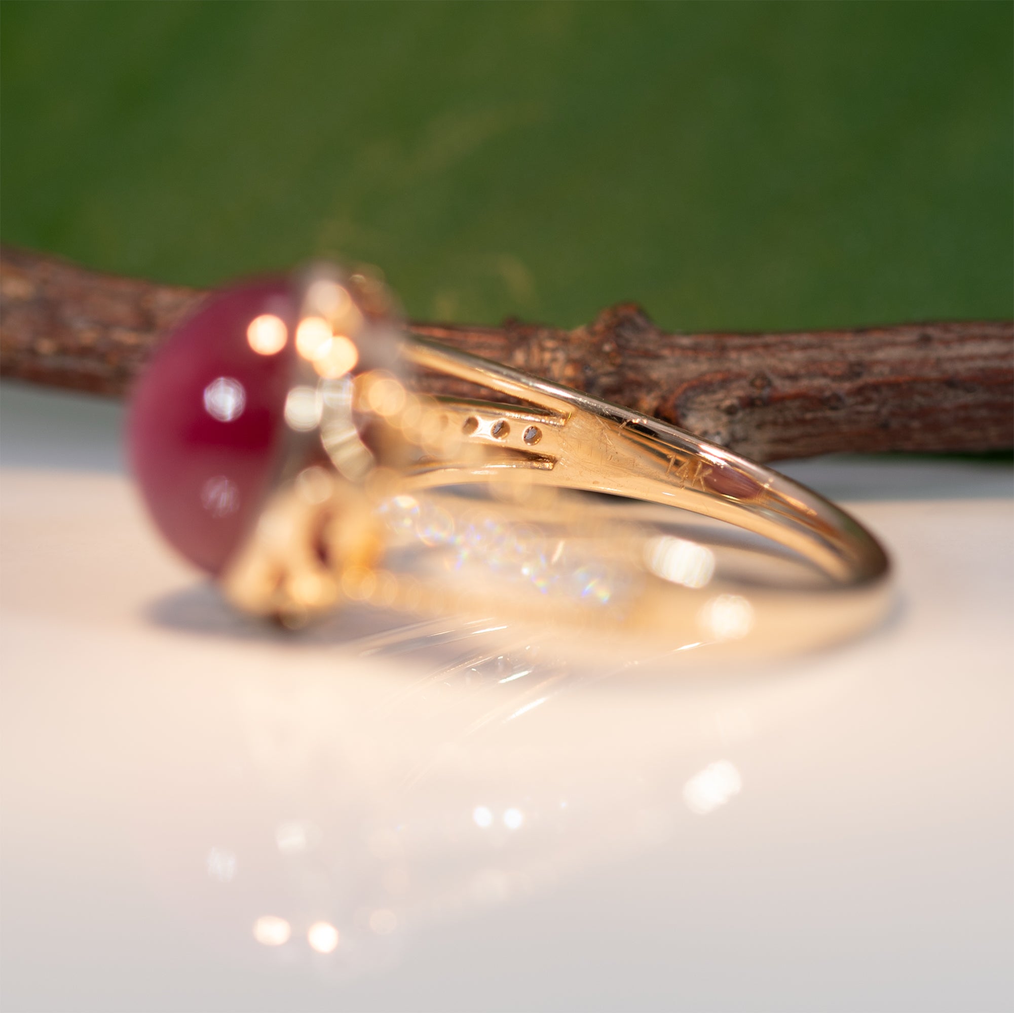 14K yellow gold star ruby cabochon ring with diamond accents