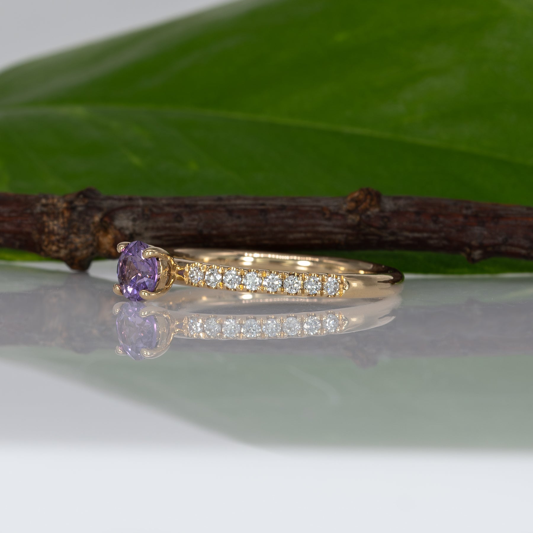 14K yellow gold purple sapphire round ring with diamond halo