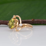 14K yellow gold sphene ring with diamond halo
