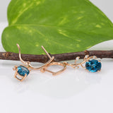 14K rose gold London blue topaz oval earrings with diamond accents