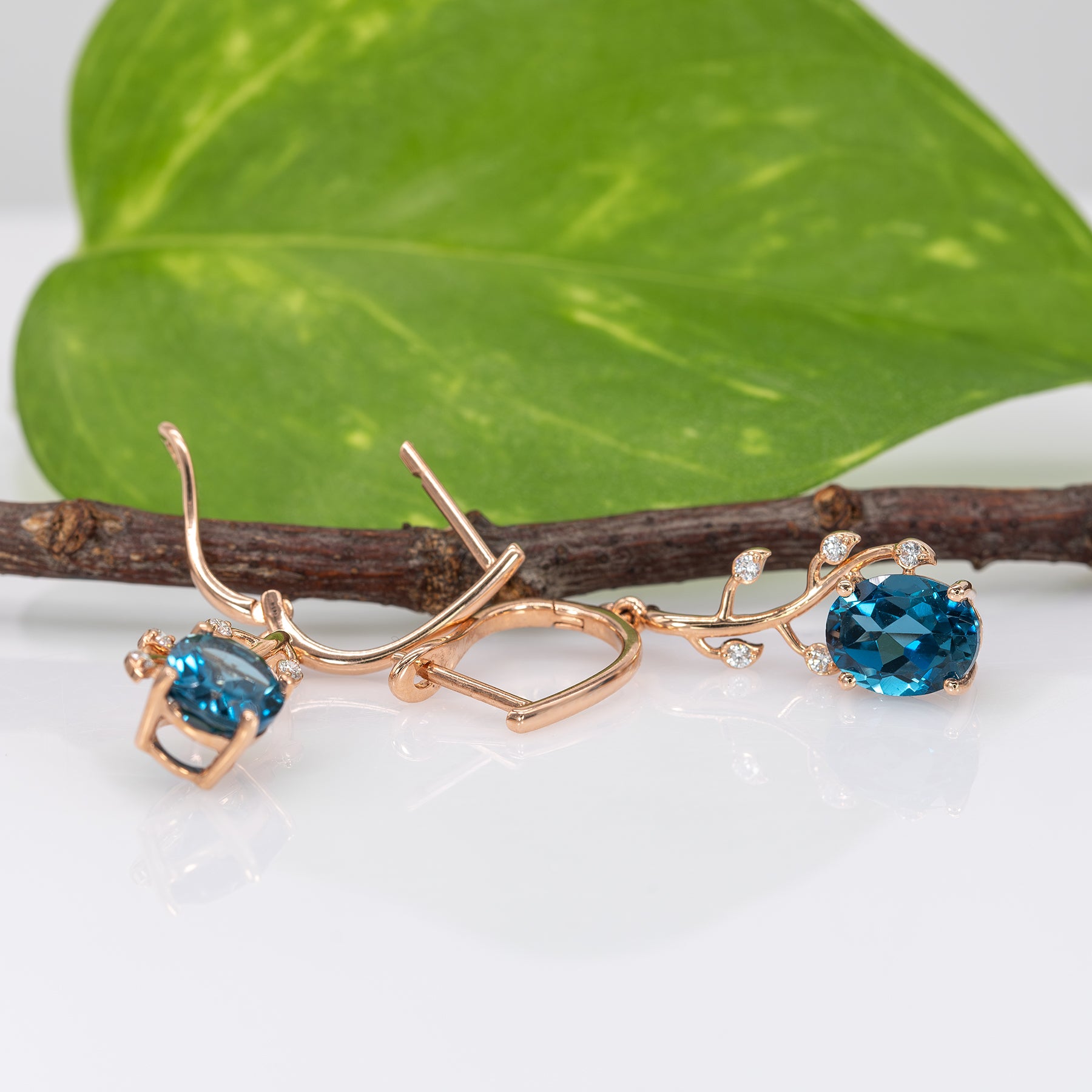 14K rose gold London blue topaz oval earrings with diamond accents